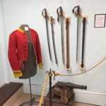 British Artillery swords and Canadian 91st regiment coat, folk art cannon